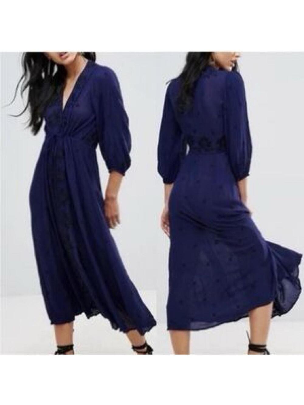 Free People Embroidered Fable Midi Dress in a deep blue colorway.